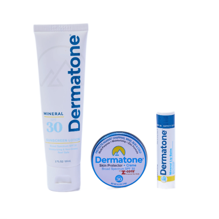 Dermatone sunscreen products including a tube, a stick, and a round container on a white background.