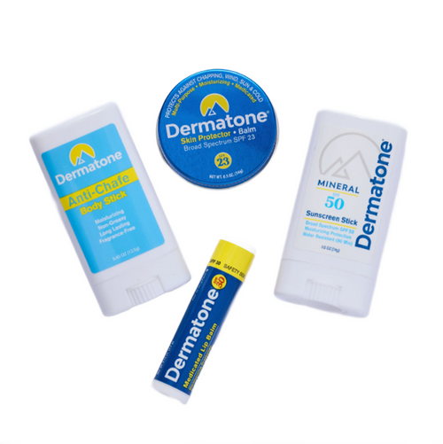Collection of Dermatone skincare products including balm, stick, and lip balm on a white background