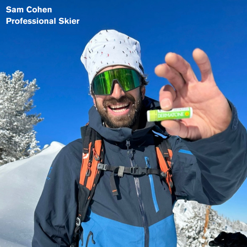 Sam Cohen holding Dermatone Green Tea Lip Balm SPF30