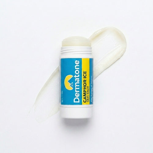 a stick of camphor ice that is open with the product rolled up